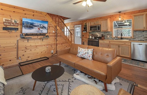 Long Barn Cabin | Escape to a cozy cabin in the pines where you can unwind, relax, and reconnect with nature.