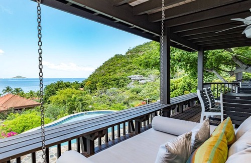 Spanish Town Villa | Escape to Paradise in This Luxury Rental Villa on Mahoe Bay.