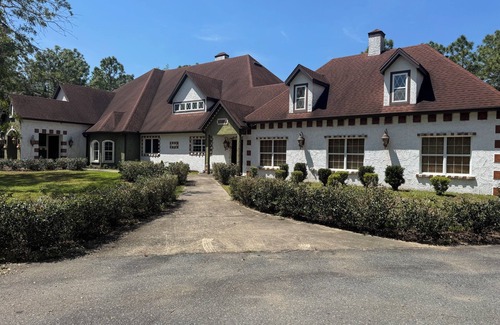 Wildwood House | Escape to this serene 4-bedroom home set on 10 private acres.