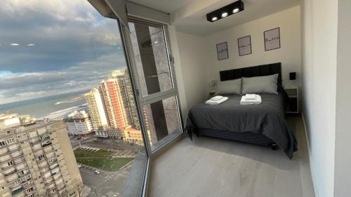 La Perla Apartment | Excelente! Vista al mar con cochera y amenities gimnasio, play room y pileta no climatizada