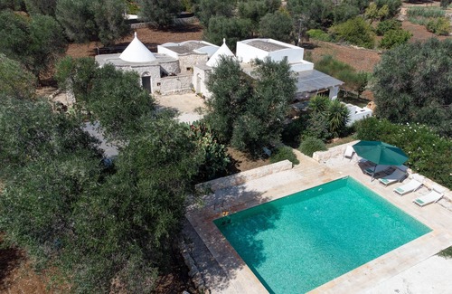 San Michele Salentino House | Experience Timeless Elegance: 1600s Trullo with Private Pool Awaits Your Stay