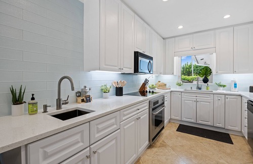 Bermuda Riviera House | Experience the Florida Sun at Beach Bunny, a Sunny Private Heated Pool Getaway!
