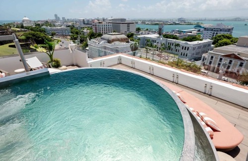 San Francisco House | Exquisite Stay w/Calming Ambiance, Rooftop Pool, and Scenic Bar - Near El Morro