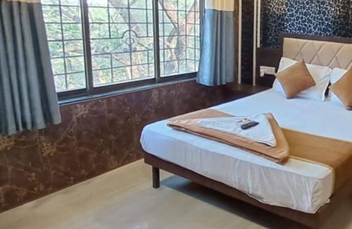 Andheri West Hotel | Fabexpress Ashirwad Residency