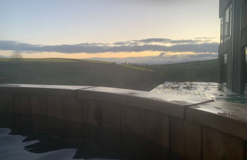 Saltash House | Fabulous barn, tennis court,wood fired hot tub tucked away on working farm