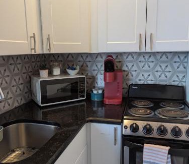 New Smyrna Beach Apartment | Fall Beach days available! Steps to the Sea!
