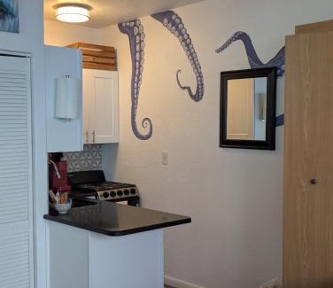 New Smyrna Beach Apartment | Fall Beach days available! Steps to the Sea!
