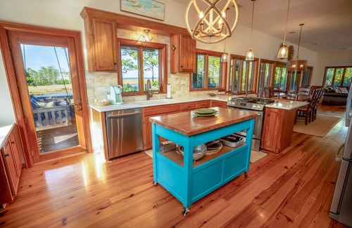 Plantation House | FALL SAVINGS! Canal Front, small dog ok, dock, screened private pool!