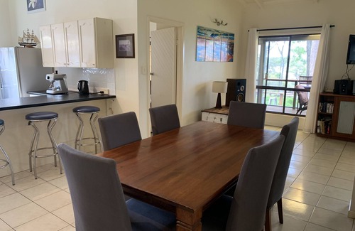 Brisbane Waterfront House | Family and Pet Friendly Peaceful Island Waterfront Home With Bikes and Kayaks