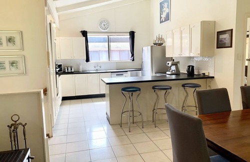 Brisbane Waterfront House | Family and Pet Friendly Peaceful Island Waterfront Home With Bikes and Kayaks
