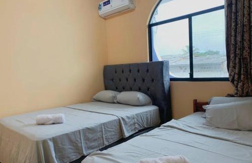Puerto Baquerizo Moreno Apartment | Family Apartment in San Cristóbal with 2 Bedrooms, 4 Beds, Living Room, Dining Area, Kitchen, Satellite WiFi and 1 Bathroom with Hot Water - CoralBay - Galápagos Home