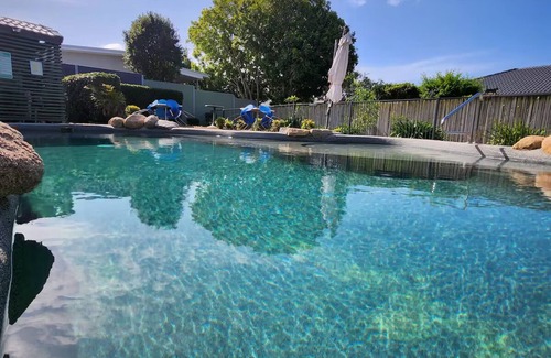 Sandstone Point House | Family friendly 3 bedroom house with garden, full amenities, and use of pool.