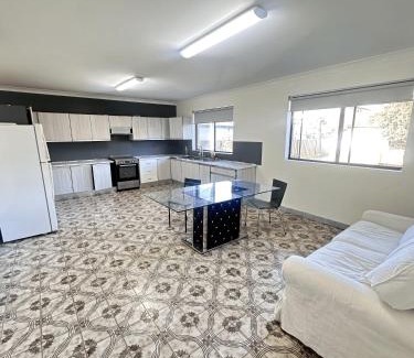Lurnea House | Family Room with Attached Private Balcony - L4