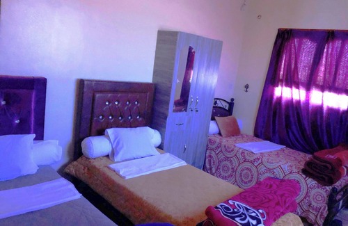 Tata Bed & Breakfast | Family Room with Private Bathroom in TATA GUEST HOUSE
