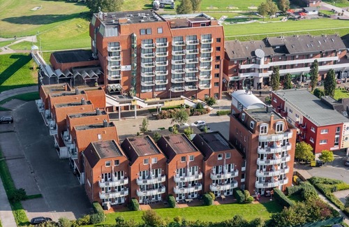 Schillig Apartment | Family vacation apartment close to the beach on the North Sea with balcony and sea view - Hus