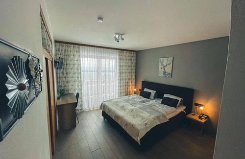 Millstatt Bed & Breakfast | Ferienwohnung 6, Südbalkon, Blick auf die Berge - Hotel-gasthof Lammersdorf