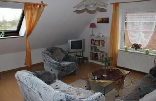 Nordseebad Burhave Apartment | Ferienwohnung in Burhave mit Grill und Garten