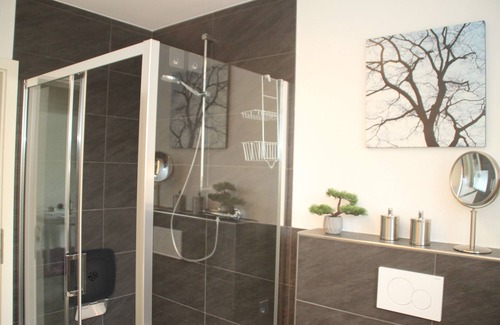 Zweifall Apartment | First class apartment with a beautiful view, winter garden, garden, and much more.