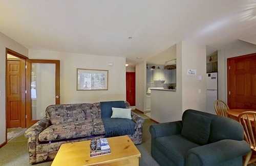 Village North Condo | First-floor condo with fireplace & patio - walk or shuttle to ski lifts
