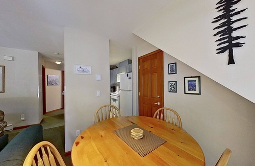 Village North Condo | First-floor condo with fireplace & patio - walk or shuttle to ski lifts