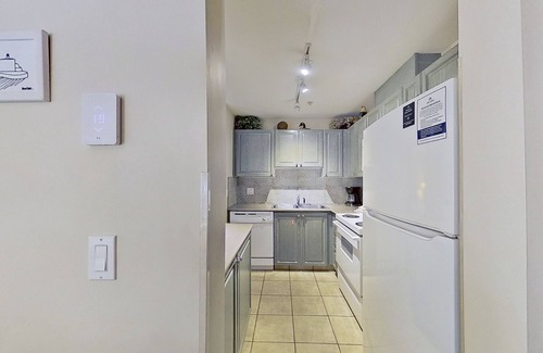 Village North Condo | First-floor condo with fireplace & patio - walk or shuttle to ski lifts