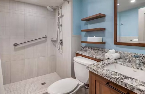 Pelican Key Resort | Flamingo Beach by Hilton: Oceanfront Resort, Pools & Spacious Studios To Relax!
