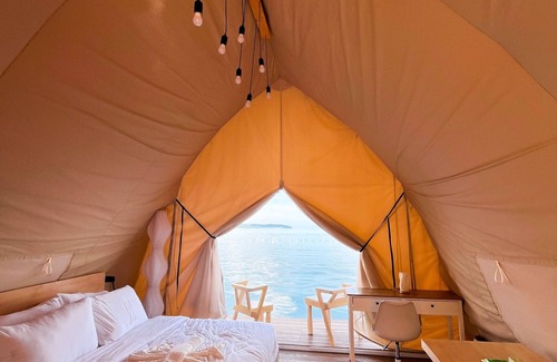 Kaputian Boat Rental | Floating Home in Reef Resort Unit 14