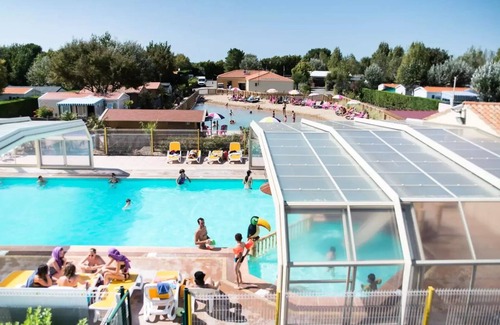 Chateau-d'Olonne Ski Chalet | Flower Camping Le Petit Paris * - Standard chalet 30m2 - 2 bedrooms + covered terrace + TV 5 persons