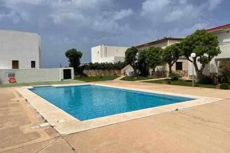 Los Delfines Apartment | Forcat - Apartamento bajo con jardín y piscina