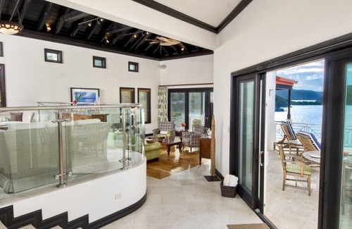 Scrub Island Villa | Four-Bedroom Villa: Luxurious bedrooms and private terraces with ocean views.