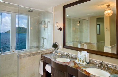 Scrub Island Villa | Four-Bedroom Villa: Luxurious bedrooms and private terraces with ocean views.