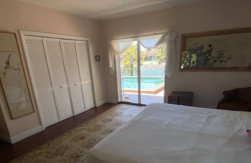 South Miami House | Four Bedroom Waterfront Vacation Home, Heated Pool - Near UM and Coral Gables