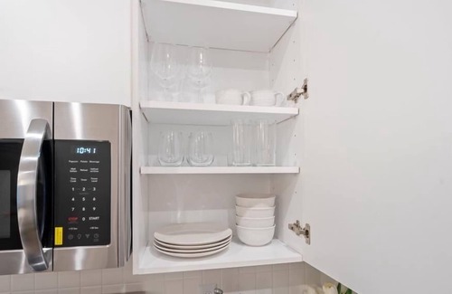 Monroe Ward Apartment | Fresh + Spacious Condo -Downtown RVA- Pool, Gym, Parking Included
