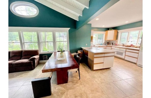 Glasser House | Fully accessible lake-house on its own island.