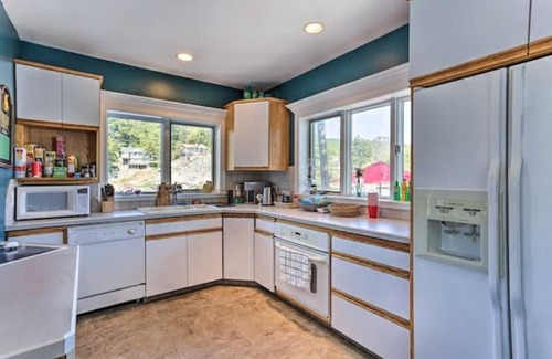 Glasser House | Fully accessible lake-house on its own island.