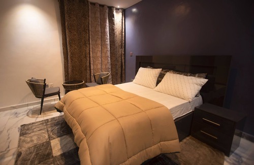 Kumasi Apartment | Fully Furnished Two Bedrooms, Modern Kitchen, Wifi