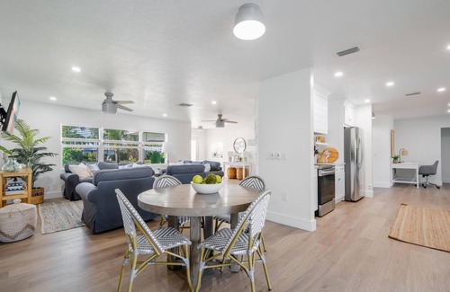 Palm River Estates House | Fully Updated Lake Front Home With Heated Pool!