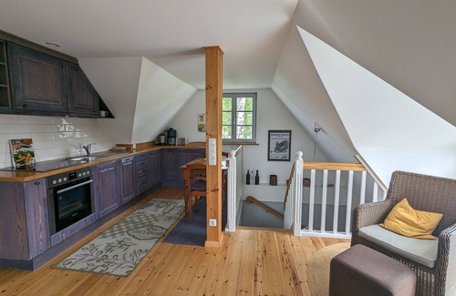 Born auf dem Darss Apartment | Gemütliche Ferienwohnung mit Großem Balkon und Strandkorn