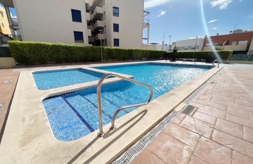 Canet de Berenguer Apartment | Global Properties, Piso practico, con terraza y piscina en la playa de Canet