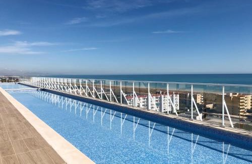 Canet de Berenguer Apartment | Global Properties, Moderno apartamento con piscina y terraza en la playa de Canet