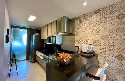 Porto das Dunas Apartment | Golf Ville Apto 3 suítes, nascente e vista mar