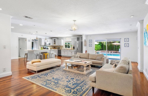 North Palm Beach House | Gorgeous Beach House Open Floor Plan, Heated Extra Large Pool & Office