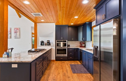 Priest River House | Gorgeous riverfront home with fireplace, fast WiFi, central AC, & washer/dryer