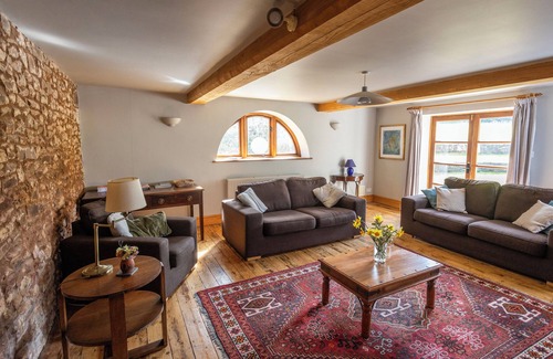 Over Stowey House | Gorgeous spacious converted barn perfect for families with large garden.