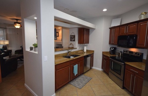 Alta Mesa Condo | GORGEOUS VACATION CONDO WITH HEATED POOL, SPA, FITNESS ROOM, PATIO, GARAGE