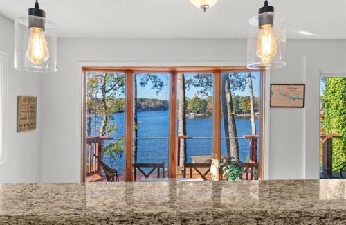 North Shore Acres House | Gorgeous views on large, quiet cove just off Main Lake.
