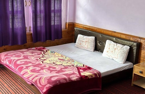 Banjar Hotel | Goroomgo Anjali Homestay