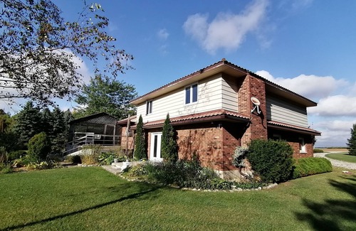 Bouvet Island House | Grand Bend Cottage. Private 26 acres of magical landscape & exclusive pond.