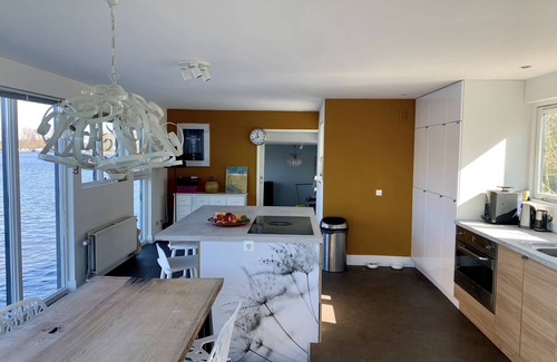 Amsterdam East Boat Rental | Grand luxury water villa on Amstel river