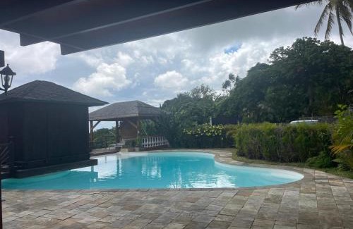 La Riviere Saint-Louis House | Grande Villa et Bungalows dans un Jardin créole avec Piscine et Vue Panoramique